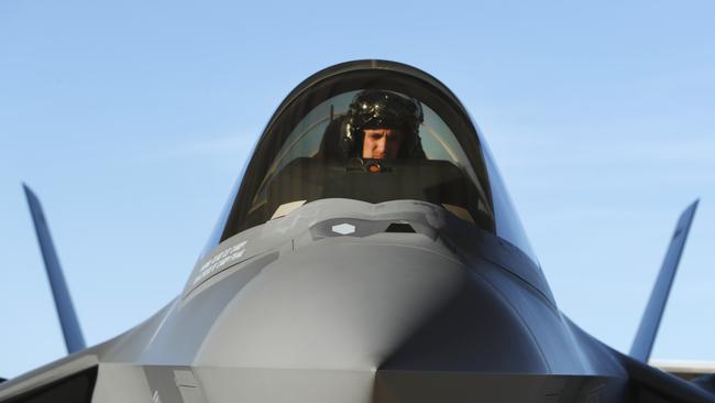 A US pilot sits in the cockpit of an F-35 fighter jet preparing for a training mission in March 2017 in Utah. Picture: George Frey