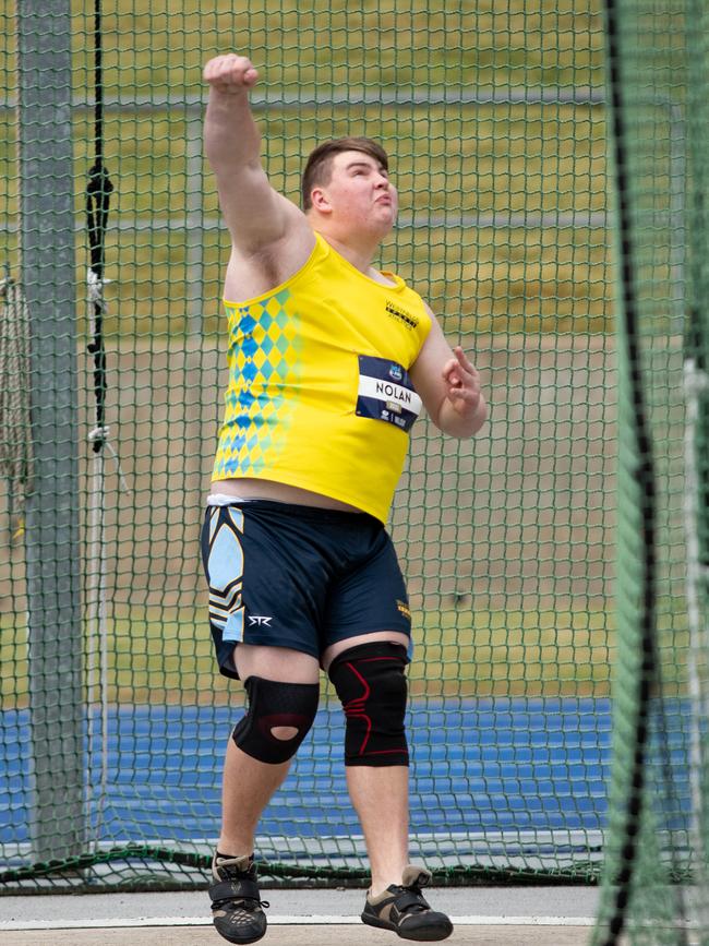 Bryce Nolan winning the boys discus 19 years final.