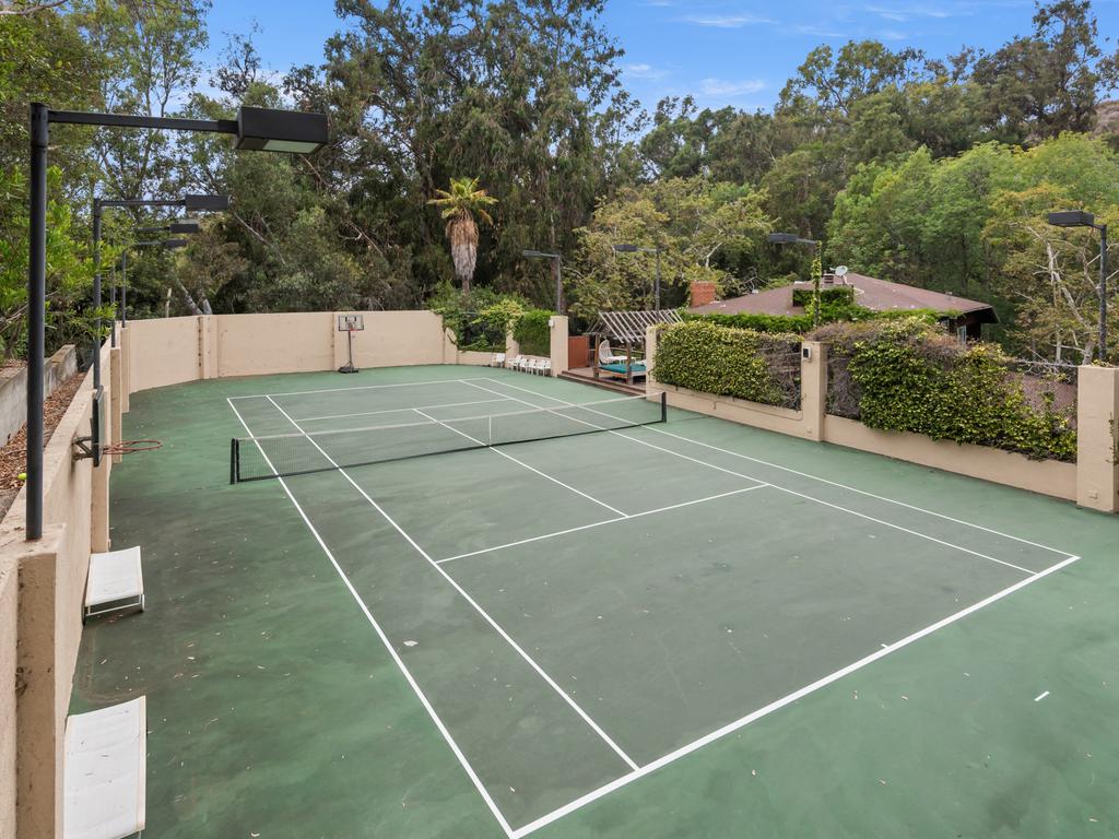 The tennis court is a great place for a workout. Picture: Marc Angeles/TopTenRealEstateDeals