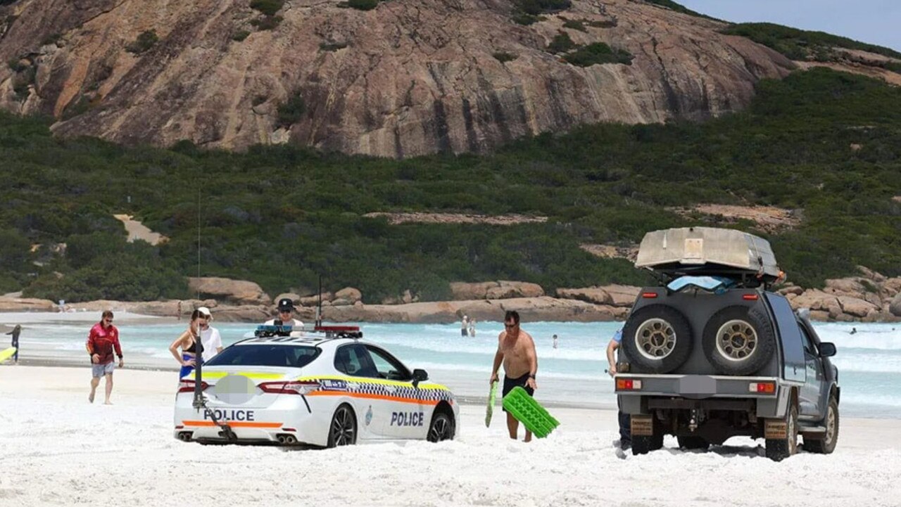 A cop car got bogged at Wharton Beach in Western Australia. Picture: Facebook/Bogged