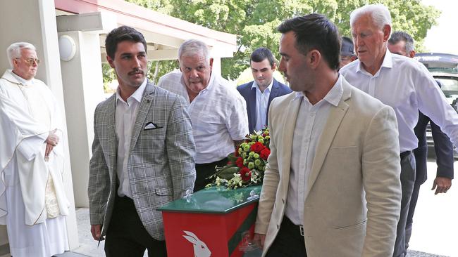 Jordan Sattler, Jack Sattler, Bob McCarthy and Ron Coote carry the casket in. Picture: NCA NewsWire/Tertius Pickard