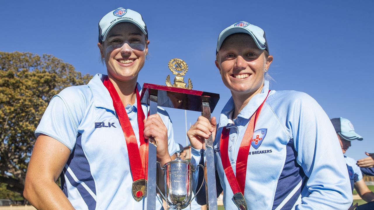 Ellyse Perry and Alyssa Healey with the trophy after the Women's National Cricket League (WNCL) at North Sydney Oval.