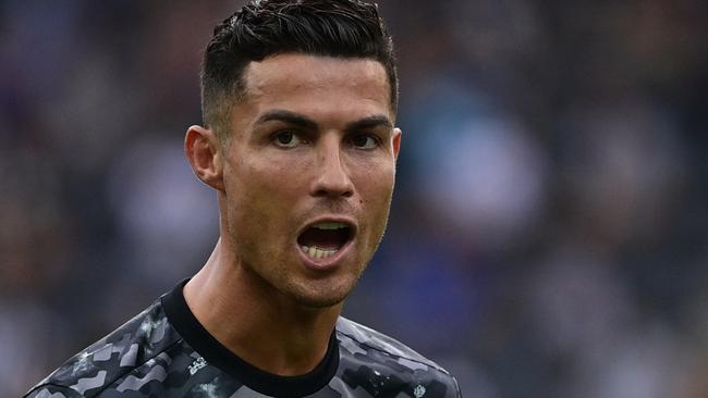 Juventus' Portuguese forward Cristiano Ronaldo warms up prior to the Italian Serie A football match between Udinese and Juventus at the Dacia Arena Stadium in Udine, on May 2, 2021. (Photo by MIGUEL MEDINA / AFP)