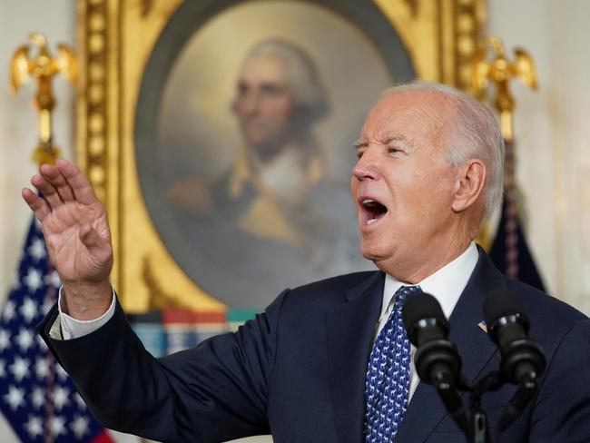 U.S. President Joe Biden reacts as he delivers remarks at the White House in Washington, U.S., February 8, 2024. REUTERS/Kevin Lamarque