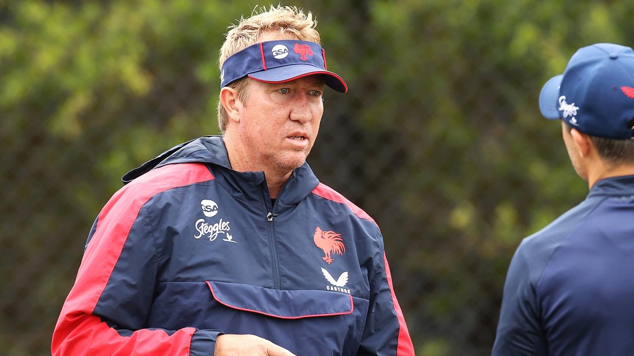 SYDNEY, AUSTRALIA - MARCH 07: Rooster head coach Trent Robinson speaks to Cooper Cronk during a Sydney Roosters NRL training session at Robertson Road Synthetic Field on March 07, 2022 in Sydney, Australia. (Photo by Mark Kolbe/Getty Images)