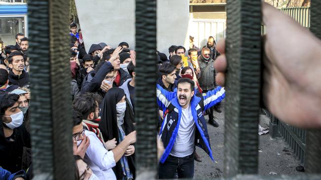 University students attend an anti-government protest inside Tehran University, in Tehran, Iran. Nationwide protests have shaken Iran over past fortnight. Picture: AP