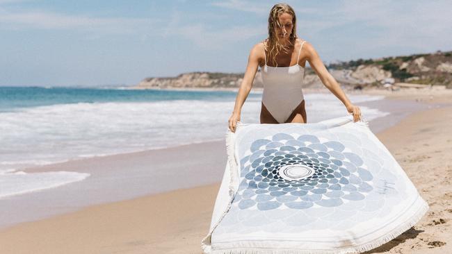 The Beach People Deia round towel, $99.