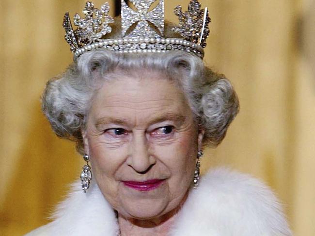 (FILE PICS) LONDON, UNITED KINGDOM - NOVEMBER 13:  Queen Elizabeth II Smiling As She Arrives At The Palace Of Westminster For The State Opening Of Parliament.  The Queen Is Wearing A Diamond Crown Known As The State Diadem Made For The Coronation Of George Lv.  She Is Wearing An Embroidered Cream Satin Dress Covered With A Fur-trimmed Robe.  (Photo by Tim Graham Picture Library/Getty Images)