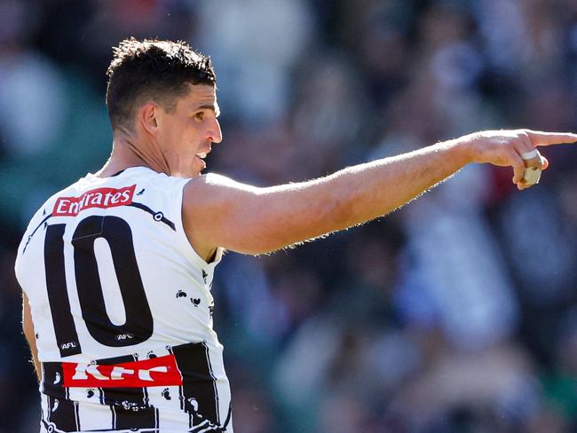 MELBOURNE, AUSTRALIA - MAY 18: Scott Pendlebury of the Magpies celebrates a goal during the 2024 AFL Round 10 match between The Collingwood Magpies and Kuwarna (Adelaide Crows) at The Melbourne Cricket Ground on May 18, 2024 in Melbourne, Australia. (Photo by Dylan Burns/AFL Photos via Getty Images)