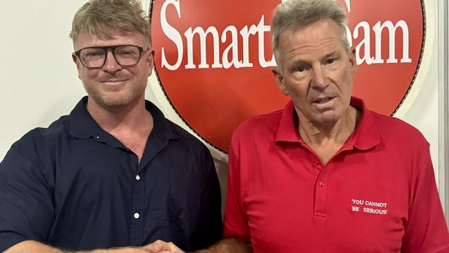 Blair Cottrell (left) and Sam Newman (right) shake hands.