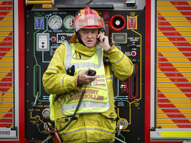 A CFA firefighter attend to an unknown chemical hazard.