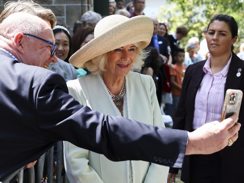 Queen Camilla takes a selfie with the crowd during a visit to St. Thomas's Anglican Church in Sydney, Australia. Picture: NewsWire / Toby Melville