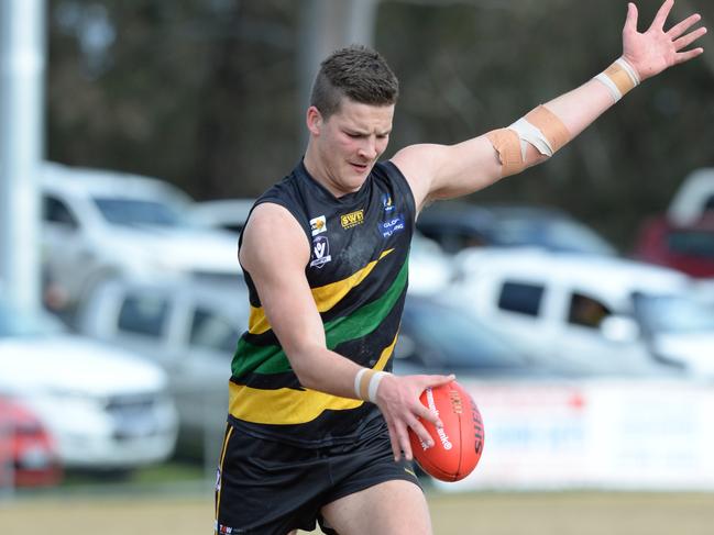 Will Geurts takes a kick for Dromana. Picture: Chris Eastman