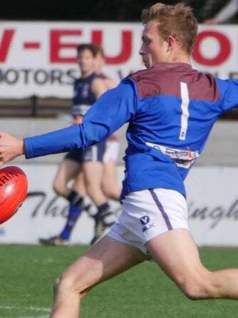 Sam Glenn takes a kick for Peninsula Old Boys.