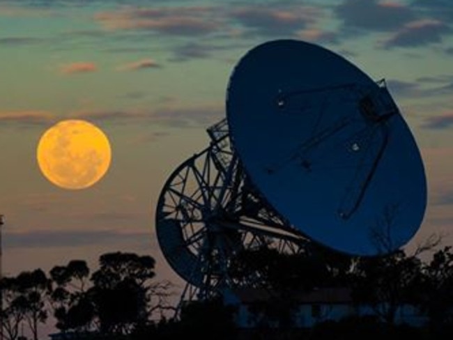 Here’s one of the supermoon from Mt Pleasant, just before it went into the clouds . Reader’s picture: MATT OSBORNE