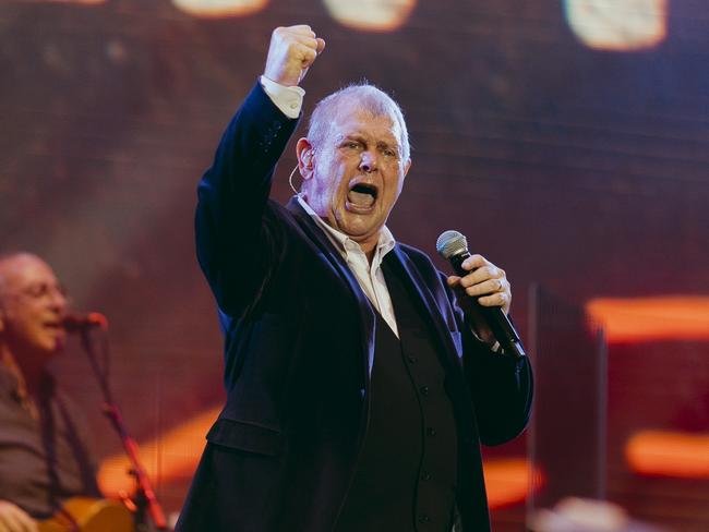 Iconic Aussie singer John Farnham may never perform live again after undergoing a 12-hour surgery to remove a tumour in his mouth.