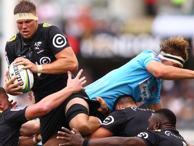 Stephan Lewies of the Cell C Sharks out jumps Ned Hanigan of the Waratahs.