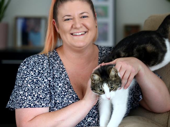 A cat missing for three years from its St Abans Park family has been reunited after being found at Point Henry. Owner Jess Millar and cat Willow.picture: Glenn Ferguson