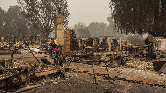 Homes lie in ruins in the burnt-out town of Talent, Oregon. Picture: AFP