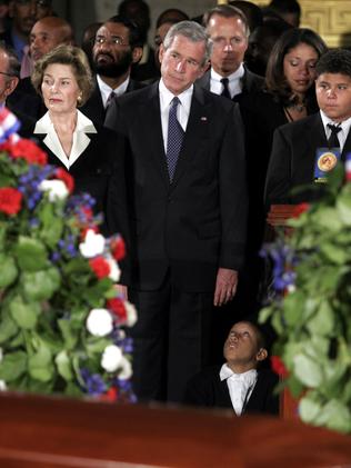 US President George W. Bush (C) during a ceremony honouring Rosa Parks in the Capitol Rotunda in 2005. Picture: AFP