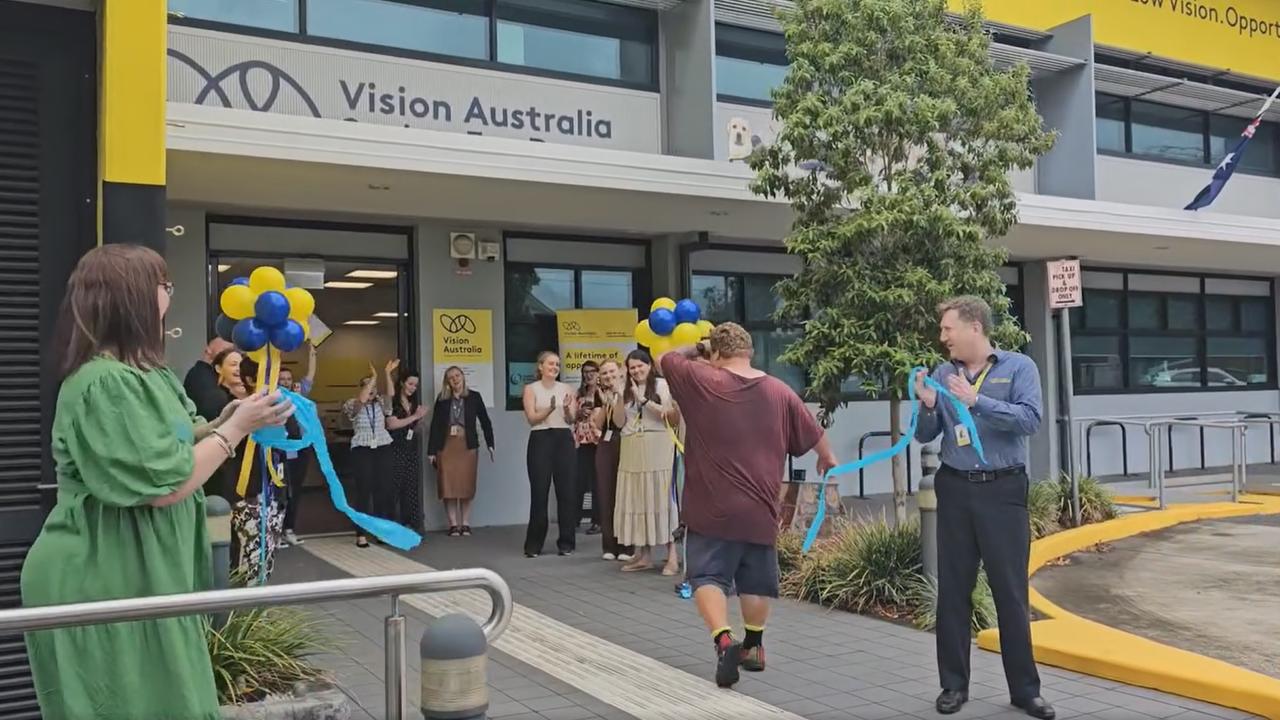 Charlie Hughes finishing his 230km walk from Nanango to Coorparoo to raise money for Vision Australia.