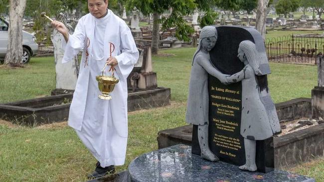 Father Neville Yun from St Mary&#39;s Catholic church does the blessing. Picture: Lyle Radford