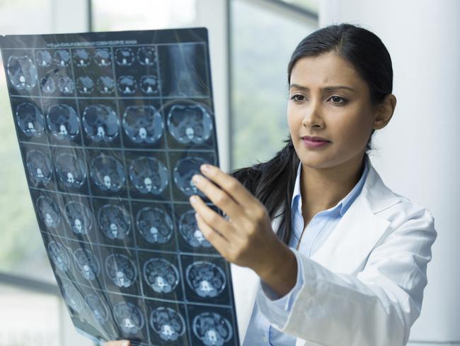 Generic photo in hospital - doctor looking at an xray (x-ray).  Picture: iStock