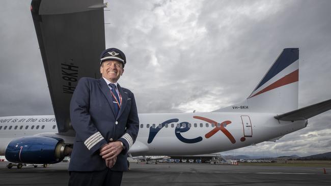 Captain Phil Bunder with the new Rex Boeing 737- 800 at Hobart.  Picture: Chris Kidd