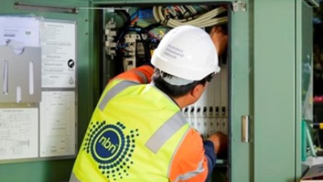 An NBN contractor does installation work in Newcastle. Photo: Supplied