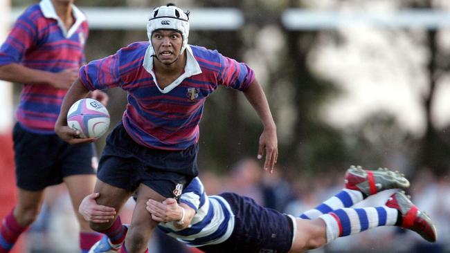 Kurtley Beale tries to escape Alistair Clifton’s grasp. Picture: Gregg Porteous