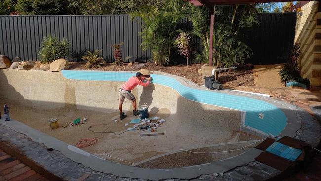 A worker from Townsville Family Pools working on a pool owned by Melissah Collins in Charters Towers. She said her dealings with the pool business had been “just a nightmare”. Picture: Supplied