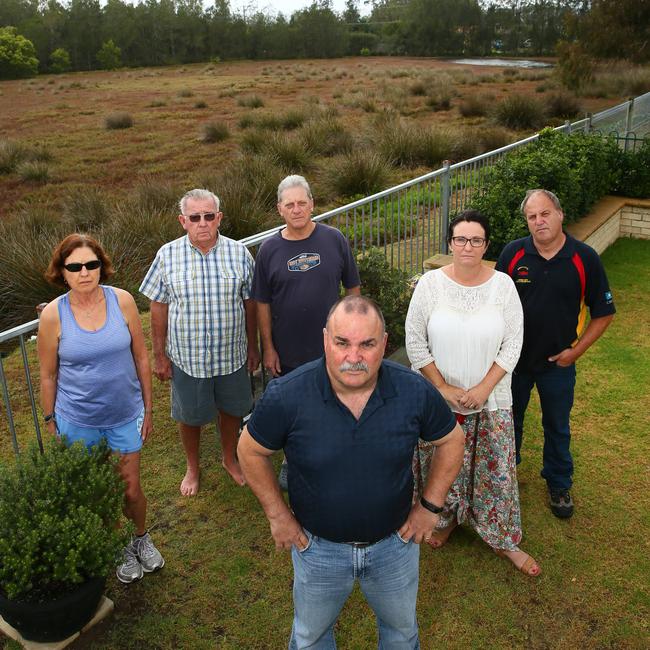 Jeff Sundstrom, (centre), with concerned Davistown residents last year. Picture: Peter Clark