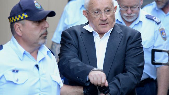 Ron Medich is led from court today. Picture: Jeremy Piper