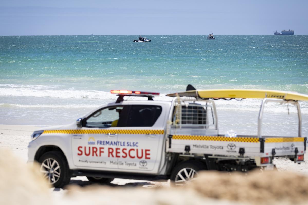 Rescue crews at Leighton beach after the attack.