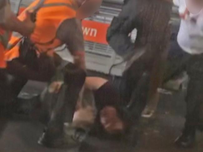 Footage shows the man being kicked in the head by an employee. Picture: Seven News 