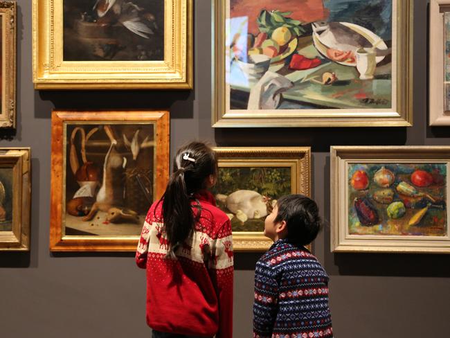 Children look at works from current exhibition This Too Shall Pass. Picture: TMAG