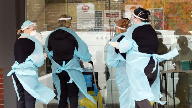 A Covid testing team arrives at Arcare aged care in Maidstone to test staff and residents. Picture: David Crosling