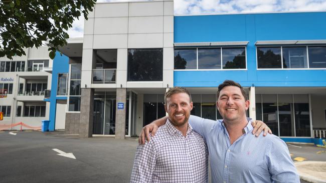 Hutchinson Builders team leader Sean Lees (left) with Cushman and Wakefield head of national investment sales Daniel Cullinane on site of the new Hutchinson Builders Toowoomba headquarters in Kitchener St, Friday, March 10, 2023. Picture: Kevin Farmer