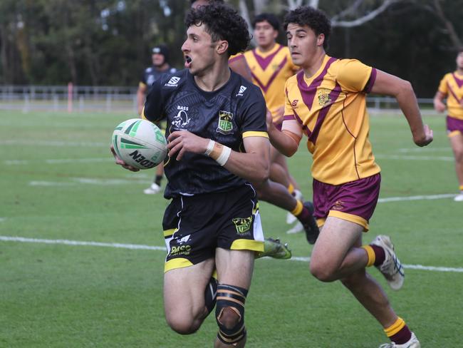 Daily Telegraph May 16/5/23. NRL Schoolboys Bass High ( black top) vs Holy Cross Ryde ( maroon and yellow cloths) play at Cabramatta.picture John Grainger