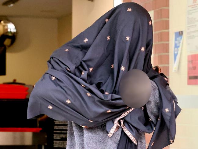 ADELAIDE, AUSTRALIA - NewsWire Photos 12,April, 2024: A 14-year-old girl leaves the Adelaide youth court after facing court on charges of possessing explosive instructions and extremist material Picture: NCA NewsWire / Kelly Barnes