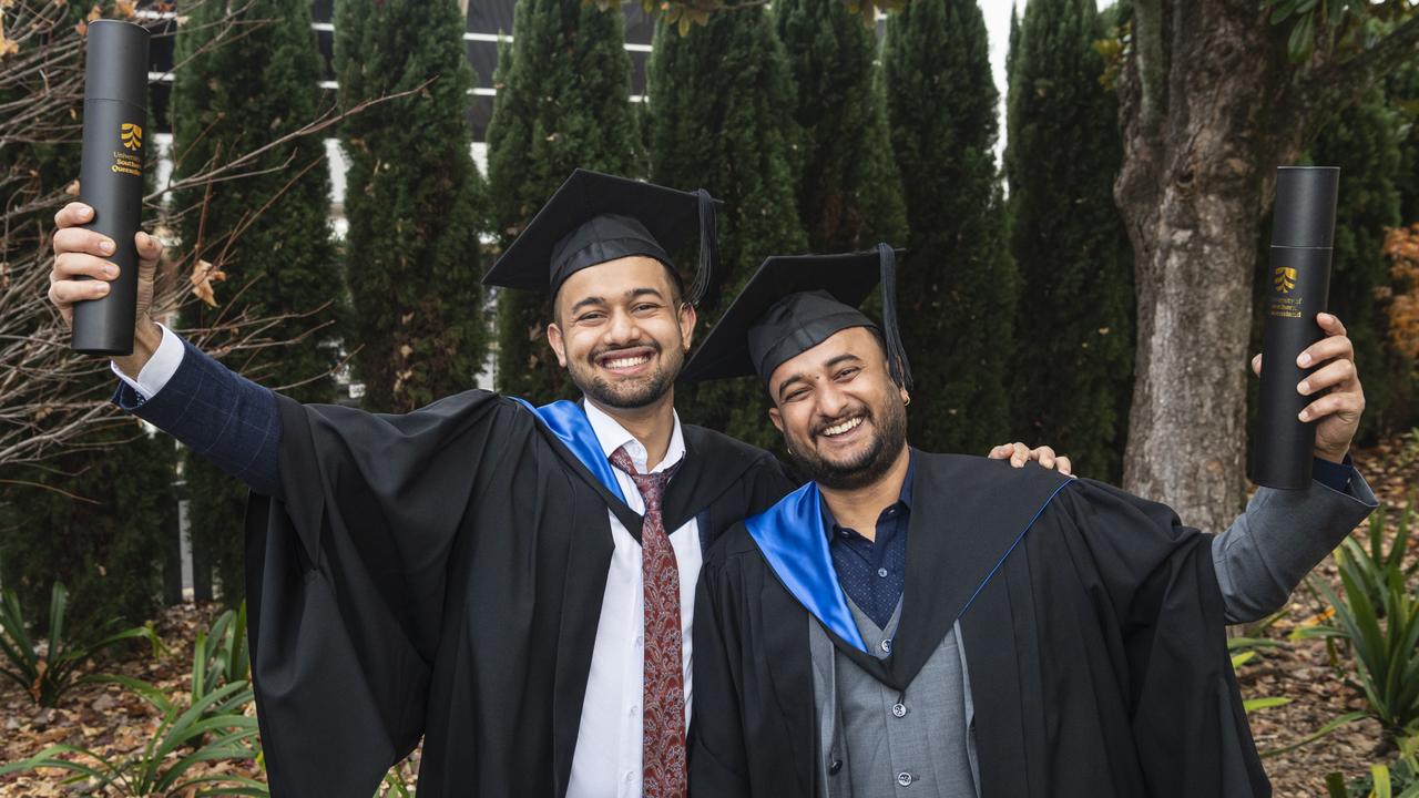 Bishal Bhandari (left) and Kamal Timsina celebrate graduating together with a Master of Science (Agricultural Science) at a UniSQ graduation ceremony at The Empire, Tuesday, June 25, 2024. Picture: Kevin Farmer