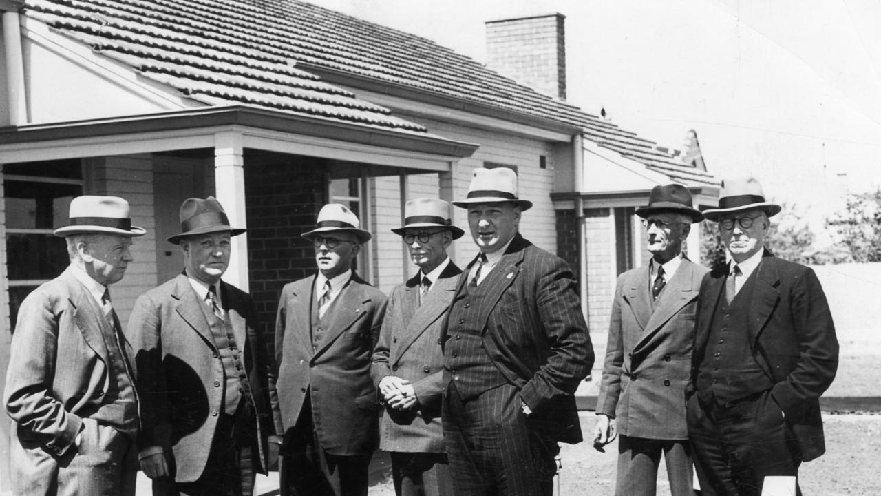 The-then premier Thomas Playford in March, 1945 inspected 16 new houses built by the Housing Trust at Eleventh Ave, St Peters. From left – Sir Henry Barwell, a member of the trust, Mr J P Cartledge (chairman), Mr Keith Bentzen (member), Sir William Goodman, the Premier, Mr H H Cowell, architect for the trust, and Sir Lavington Bonython, a member of the trust. (The Advertiser photograph Krischock)