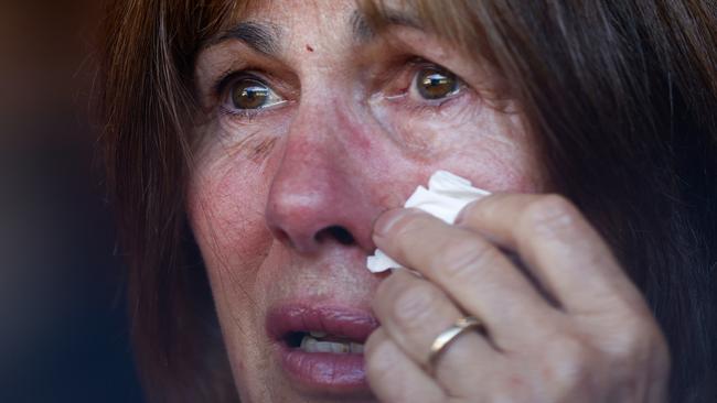 A mourner sheds a tear during the Ron Barassi State Memorial Service. Picture: Michael Willson/AFL Photos