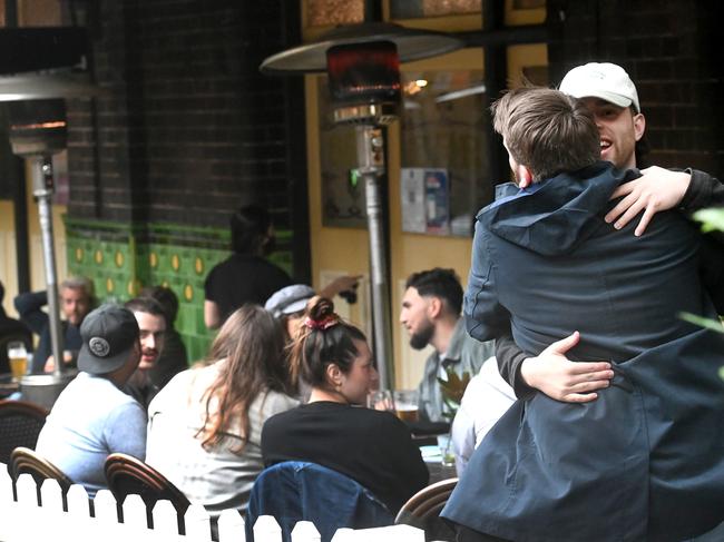 SYDNEY, AUSTRALIA - NewsWire Photos October 11 2021: Sydney-siders enjoy a drink at the Mercantile Hotel in The Rocks on Freedom Day as Covid restriction are eased in NSW.Picture: NCA NewsWire / Jeremy Piper