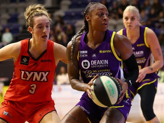 MELBOURNE, AUSTRALIA - APRIL 02: Tiffany Mitchell of the Boomers dribbles the ball against Marina Mabrey of the Lynx during game one of the WNBL Finals series between Melbourne Boomers and Perth Lynx at Melbourne Sports Centre Parkville, on April 02, 2022, in Melbourne, Australia. (Photo by Kelly Defina/Getty Images)