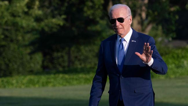 Joe Biden waves from the South Lawn of the White House. Picture: AFP.