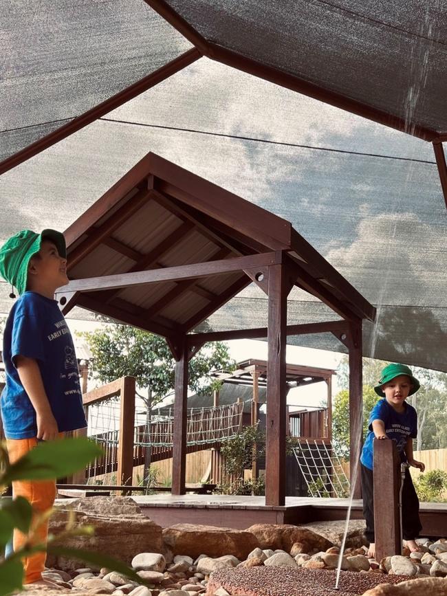 Dylan Muggeridge and Issak Breed exploring the new playground installation.