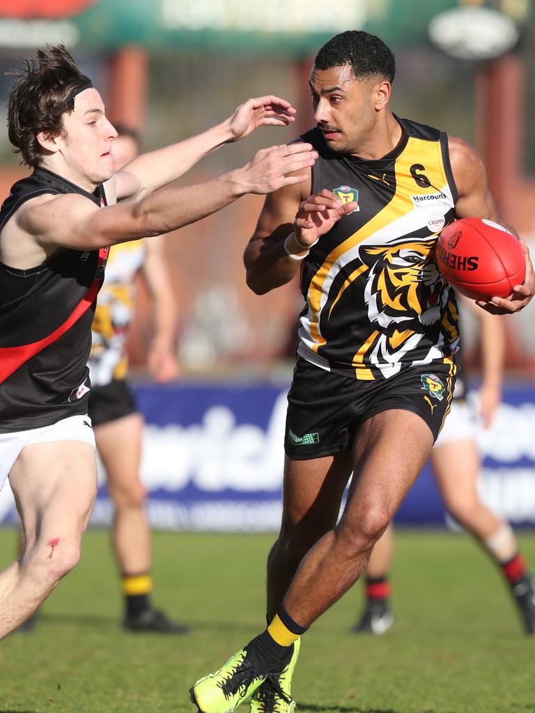 Brandon Leary North Launceston and Elijah Reardon Tigers. TSL grand final Kingborough Tigers V North Launceston. Picture: Nikki Davis-Jones