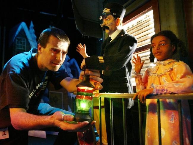 2004: Antony Howard prepares a display for the Polar Express-themed Christmas windows at Myer. Picture: News Limited