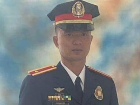 Philippine Police Lt. Christian Bolok was killed by a rooster armed with a metal blade while attempting to break up an illegal cockfight. Picture: Northern Samar Police Provincial